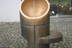 1003b